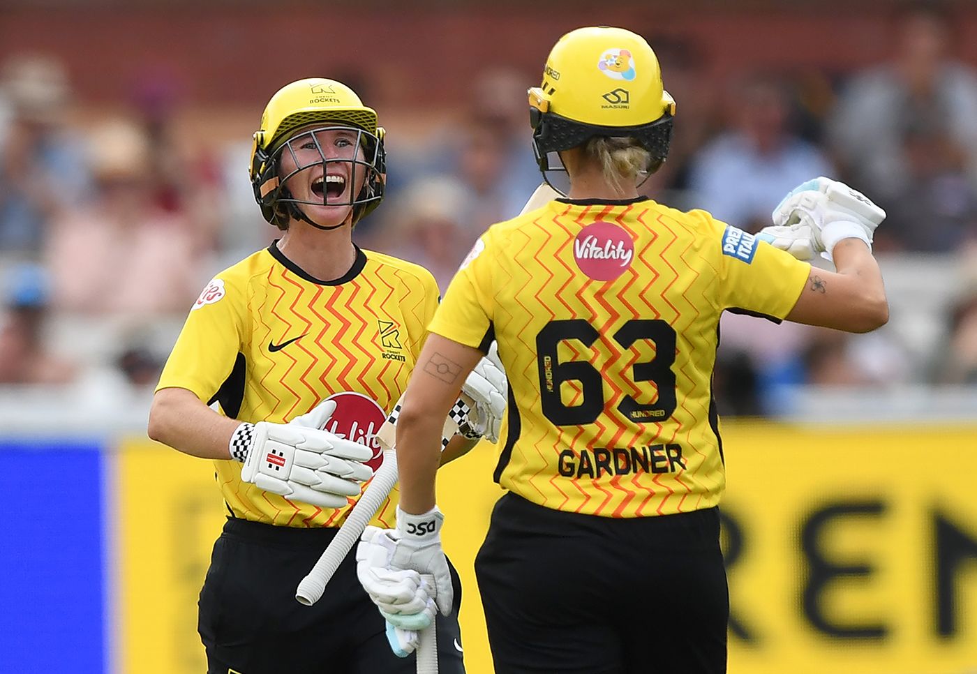 Ash Gardner and Beth Mooney celebrate