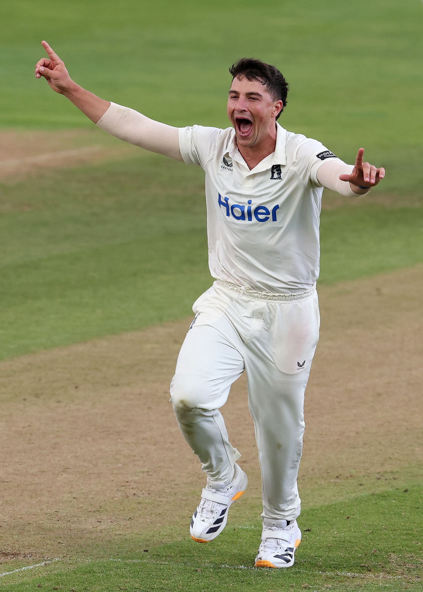 Michael Booth wheels away in celebration
