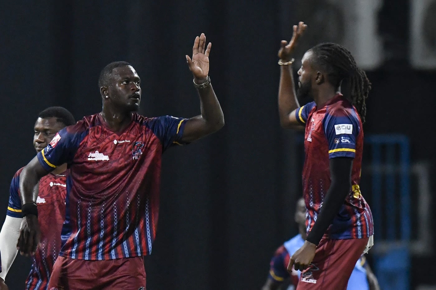 Jayden Seales celebrates with Shamar Springer