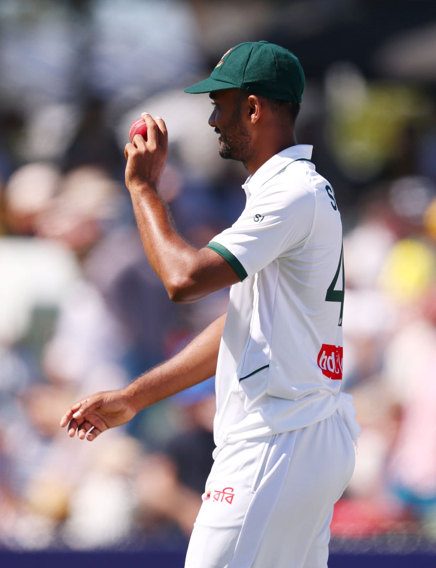 Shoriful Islam holds the ball aloft after his 7 for 48