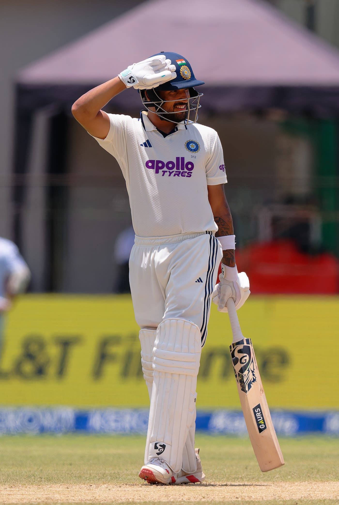 Dhruv Jurel salutes the dressing room after getting to his fifty
