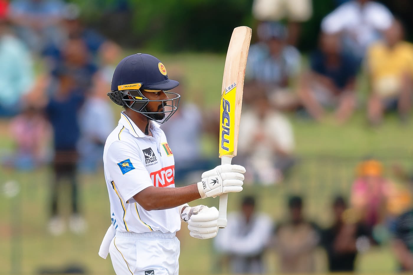 Pasindu Sooriyabandara celebrates his second half-century of the match