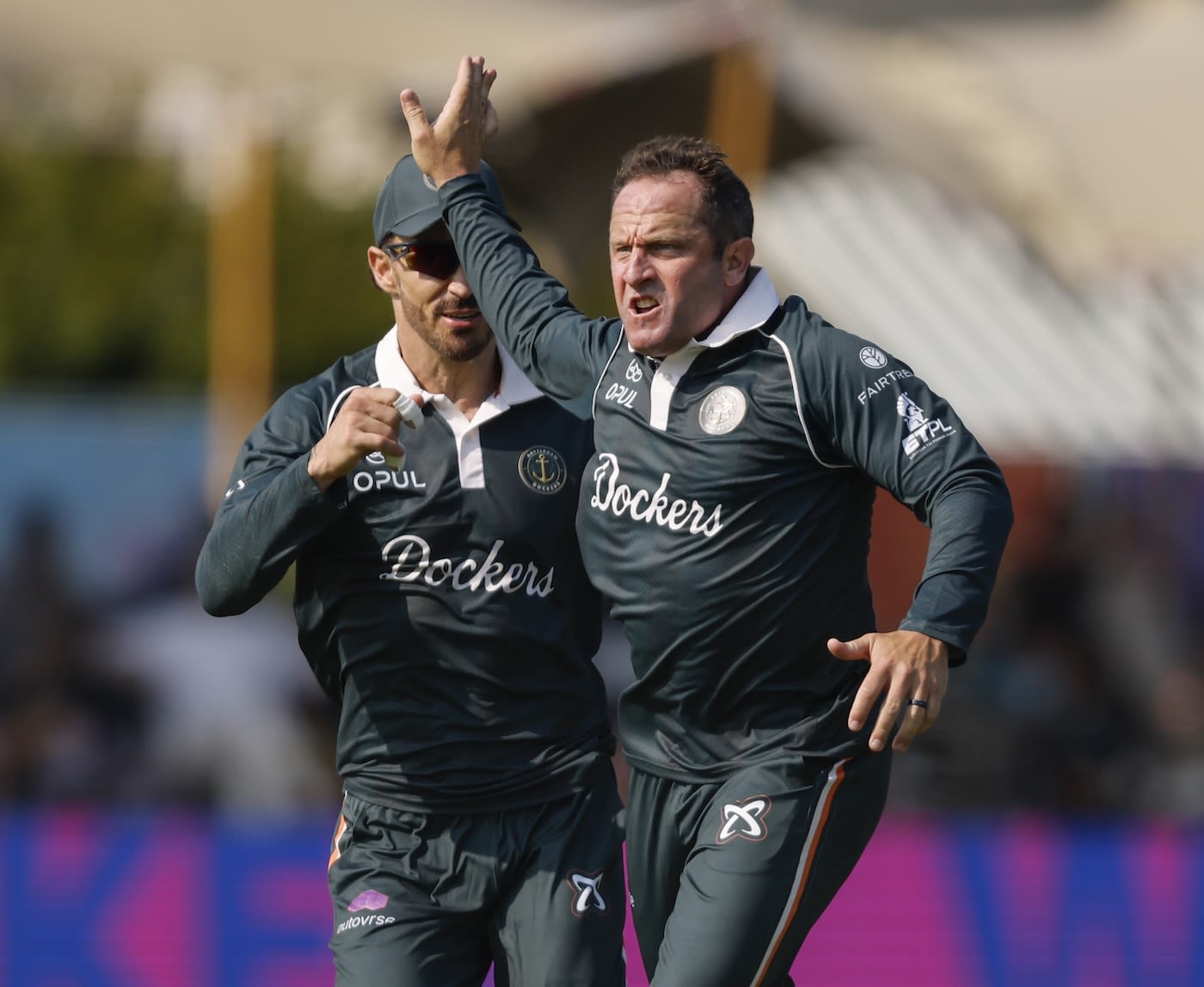 Faf du Plessis rushes to celebrate with Roelof van der Merwe