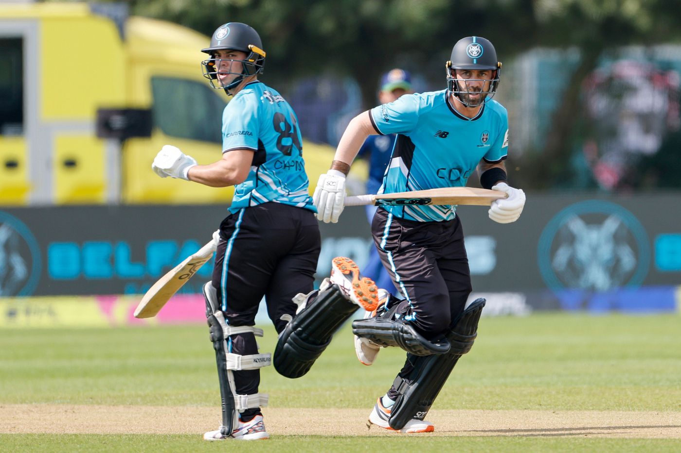 Mark Chapman and Glenn Maxwell keep an eye on the ball