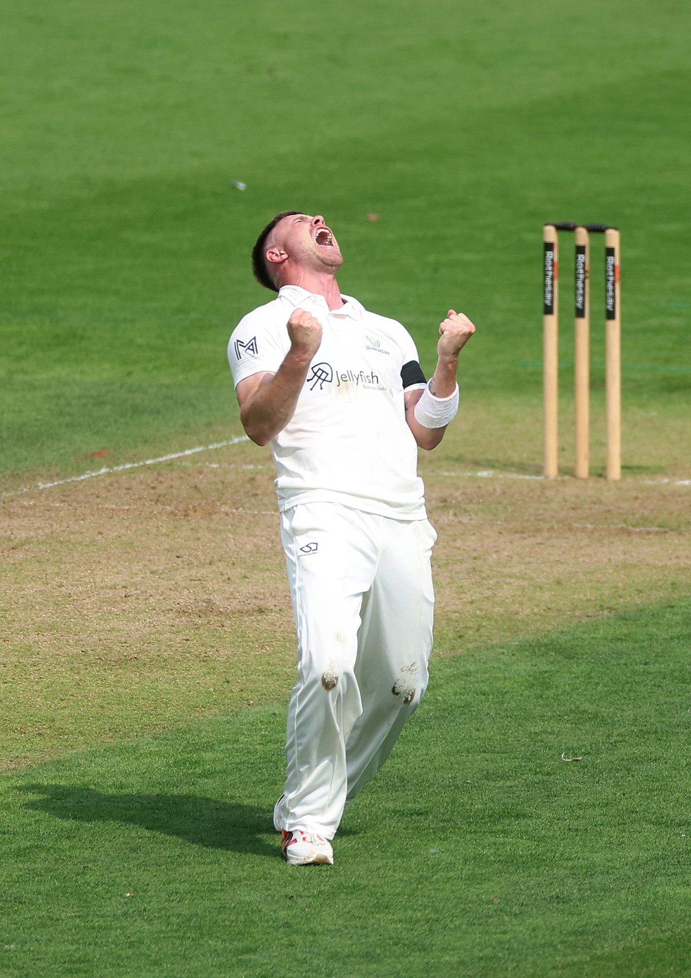 Dan Douthwaite celebrates a dismissal