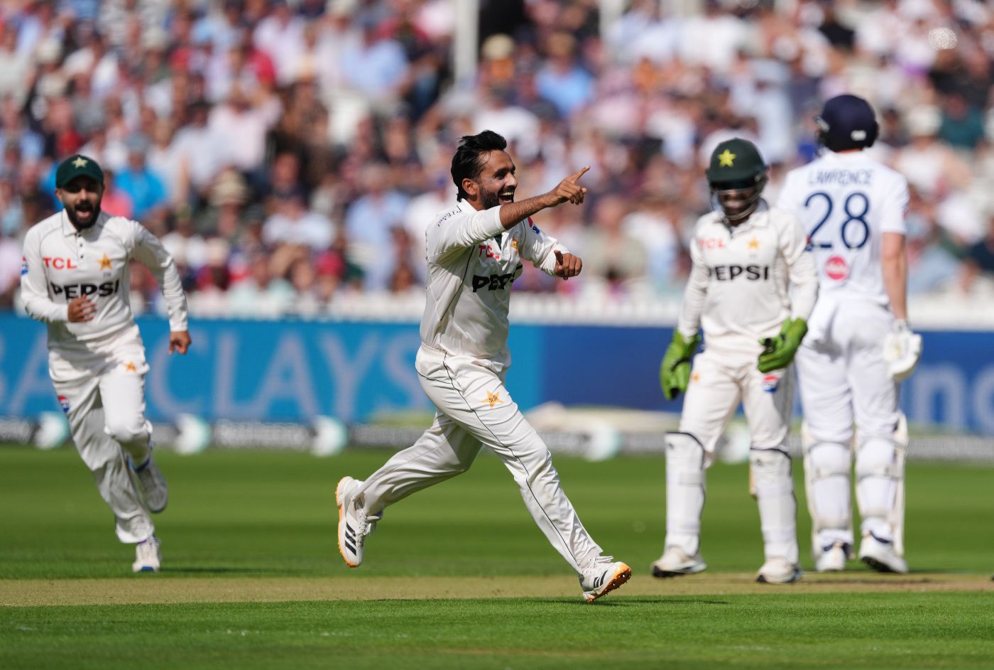 Ali Usman celebrates the run-out of Dan Lawrence