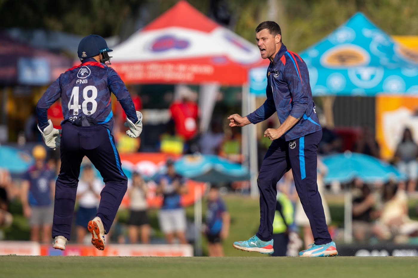 Gerhard Erasmus roars after bowling Bjorn Fortuin
