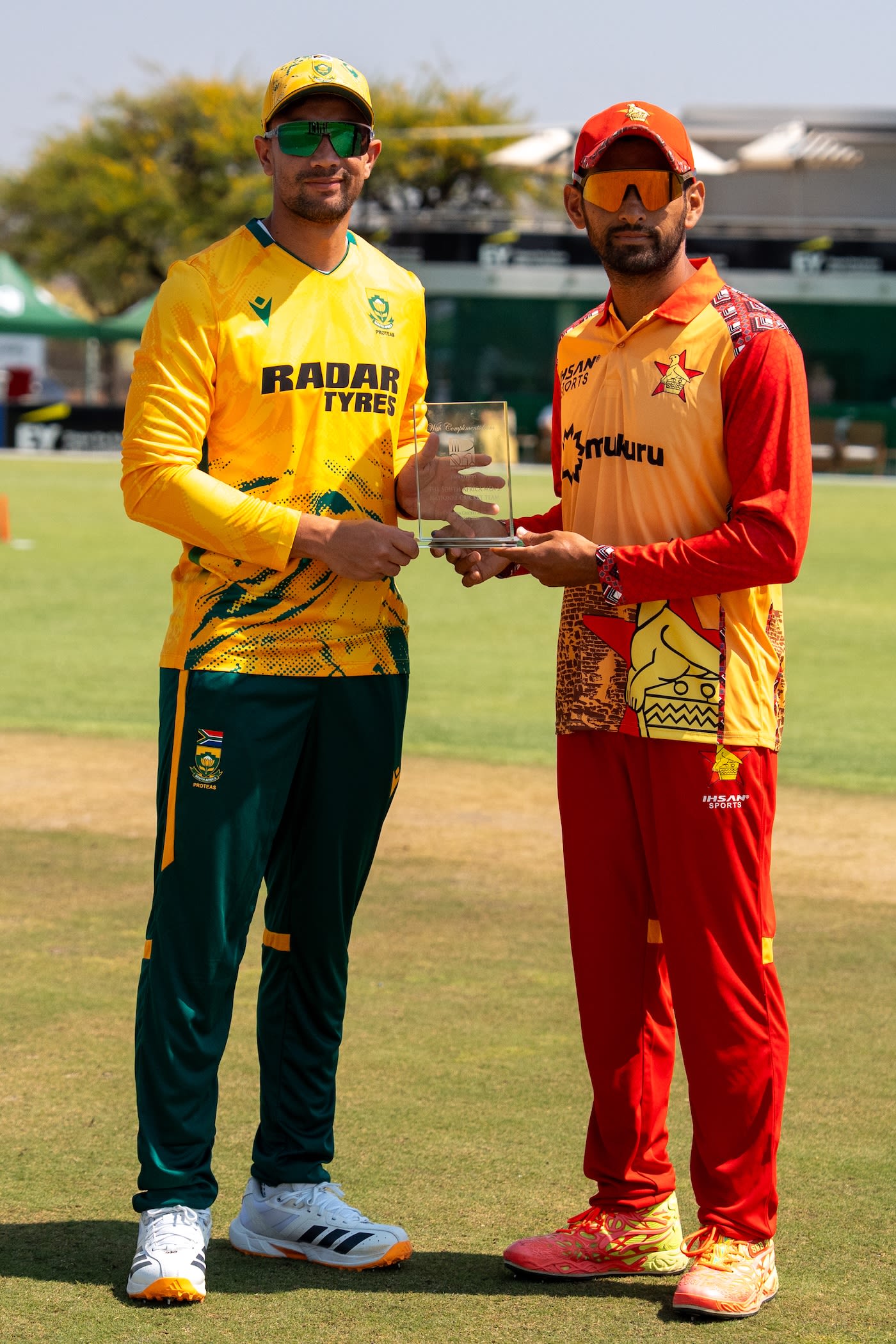 Bjorn Fortuin and and Sikandar Raza pose together before the game
