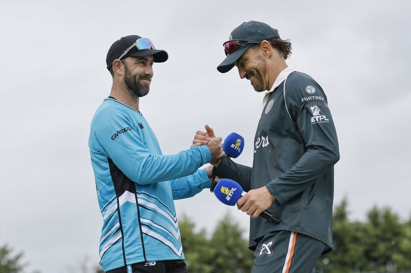 Glenn Maxwell and Faf du Plessis at the toss