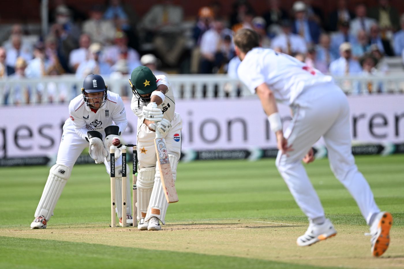 Ollie Robinson bowled Abdullah Shafique for his second wicket of the over