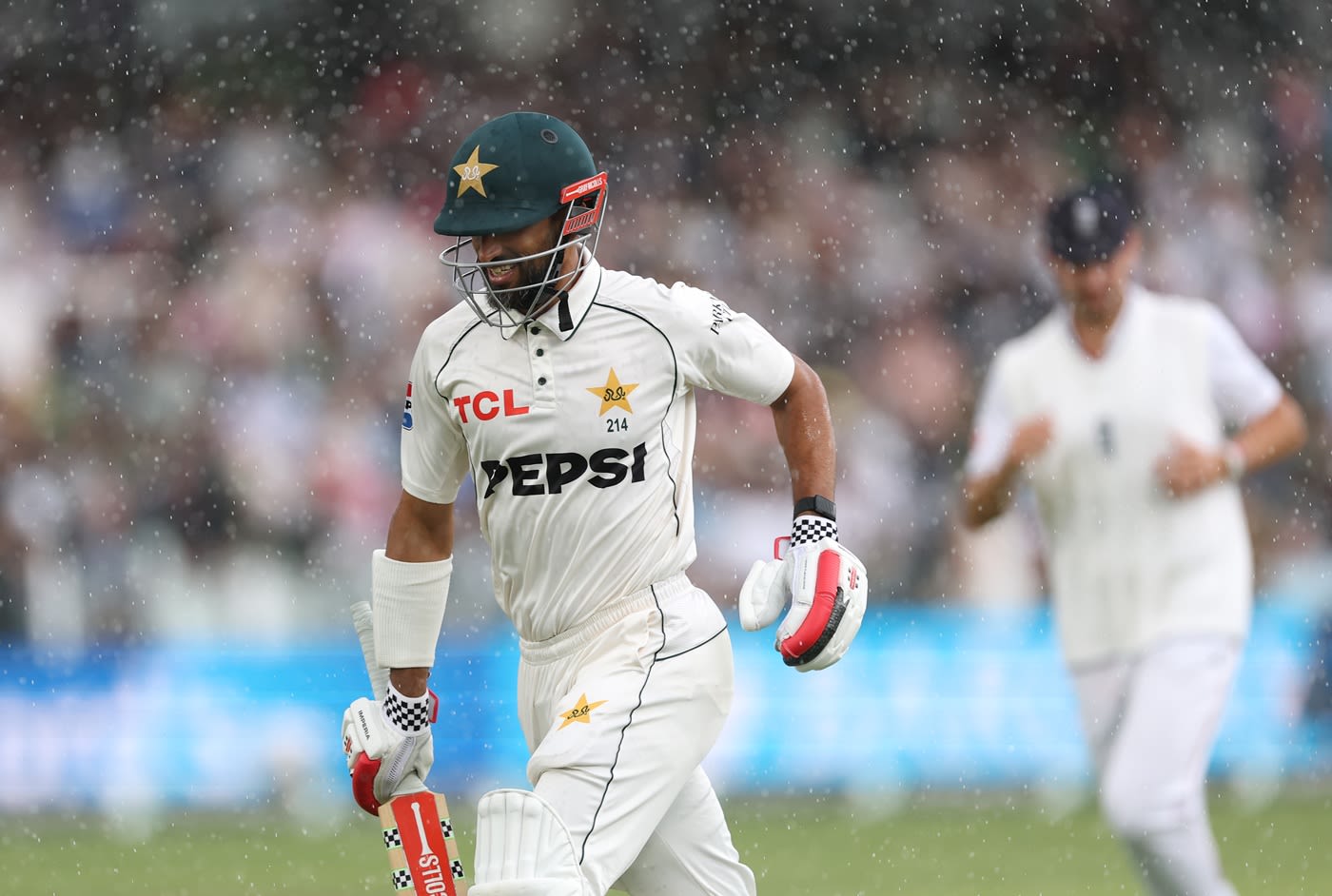 Shan Masood races off as rain stops play in the afternoon session