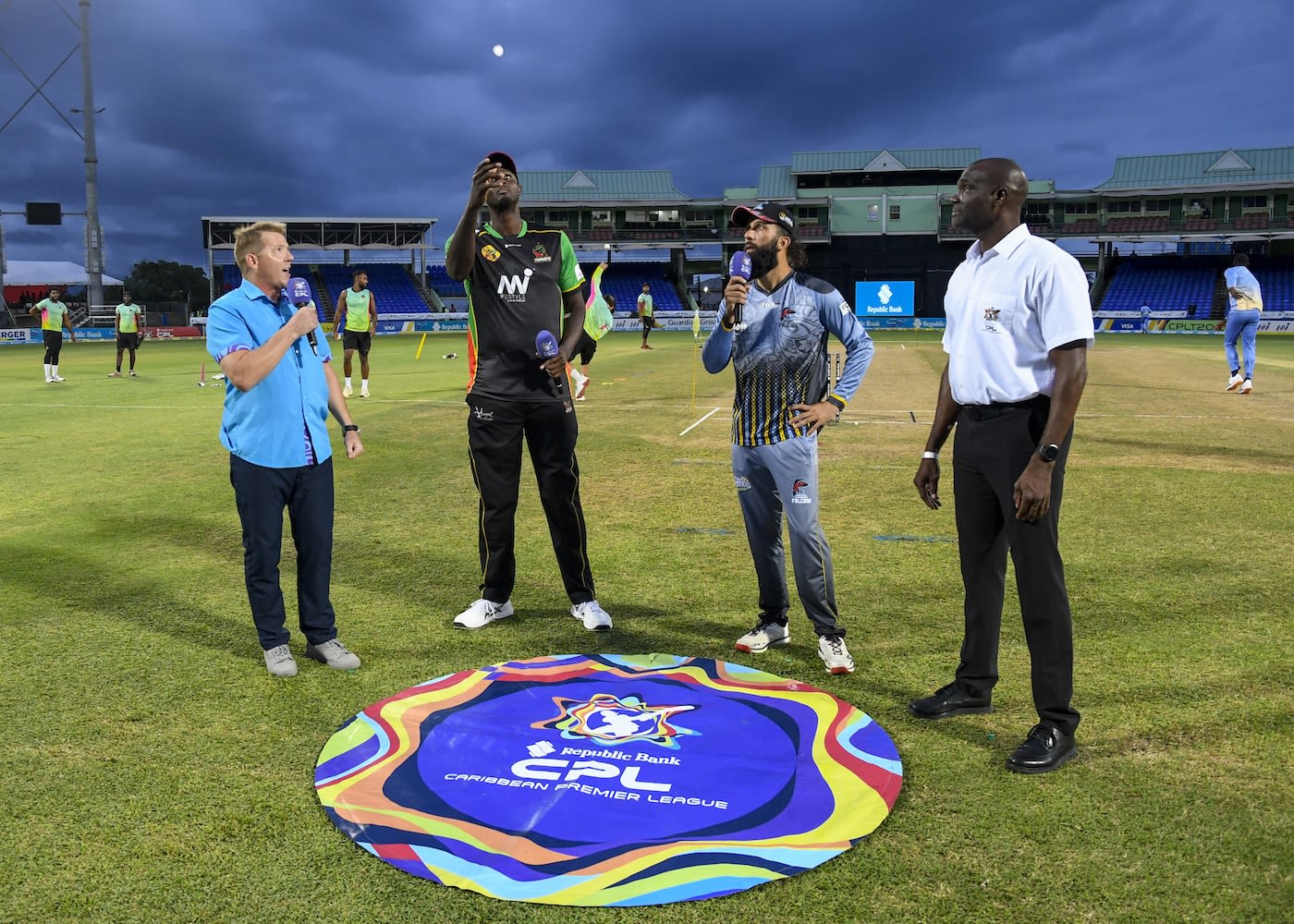 Jason Holder and Moeen Ali at the toss before the match was washed out