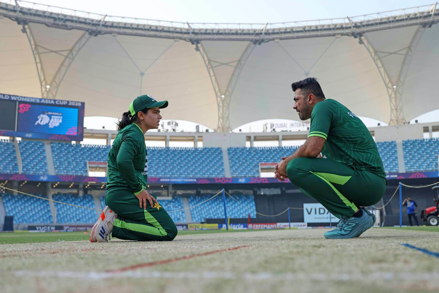 Fatima Sana and Wahab Riaz, Pakistan's captain and coach, have a chat