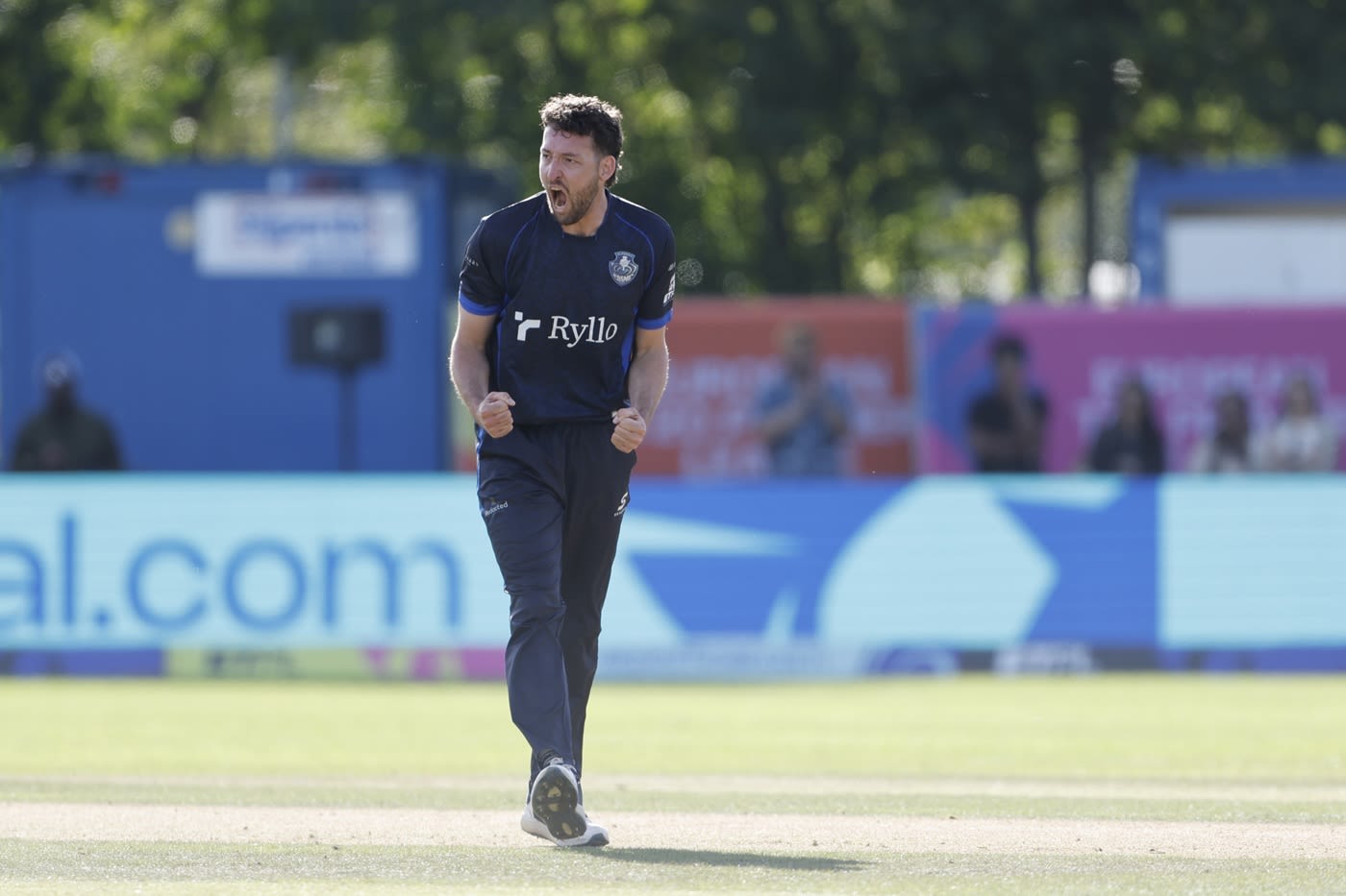 Paul van Meekeren roars after taking a wicket