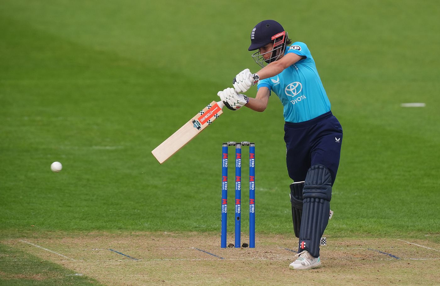 Maia Bouchier cuts on her away to fifty