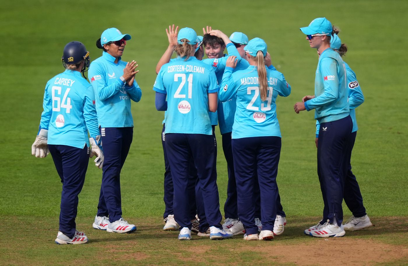 Issy Wong celebrates her five-wicket haul as Amy Hunter joins the collapse