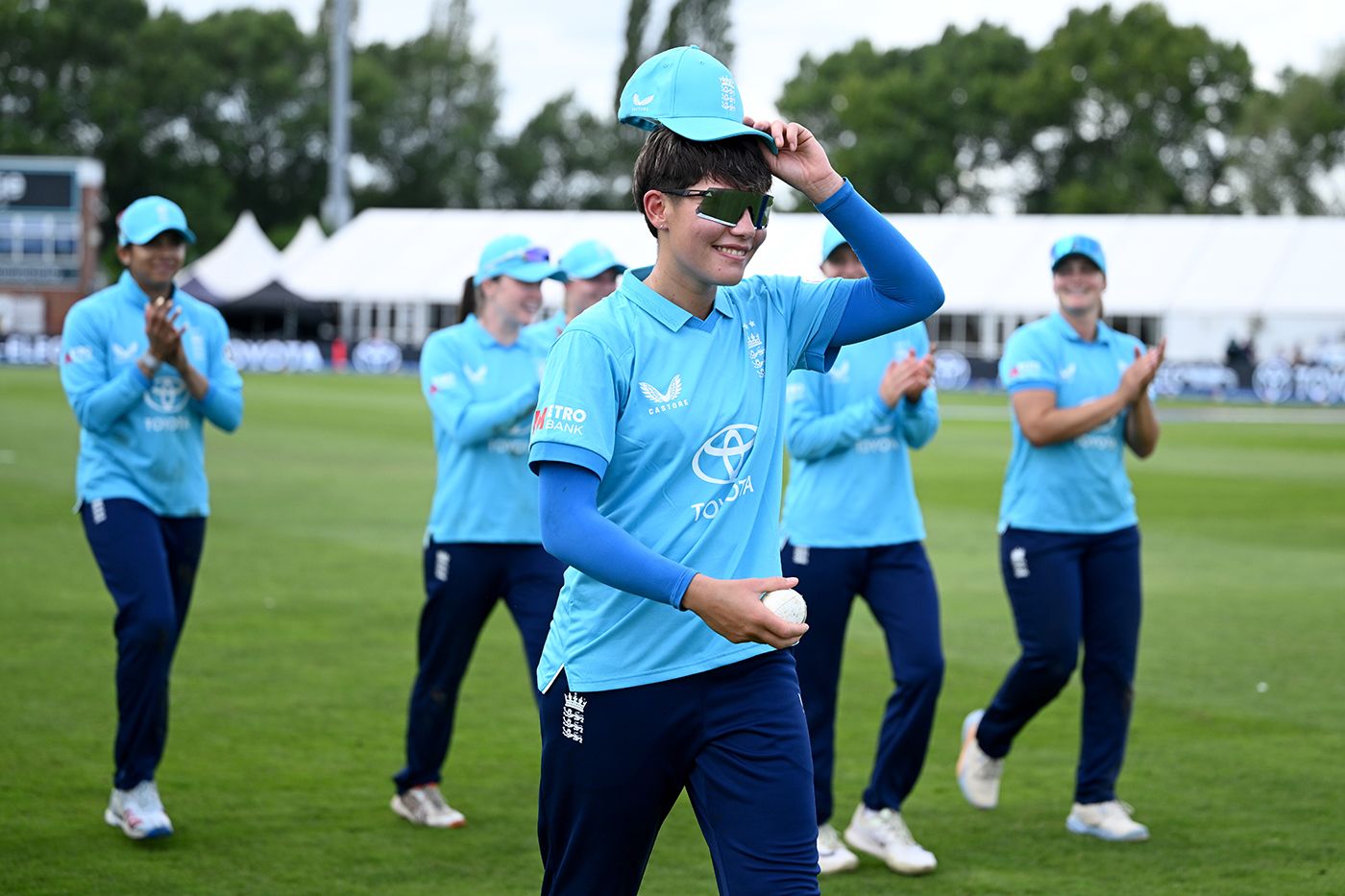Issy Wong takes the applause for her maiden international five-for