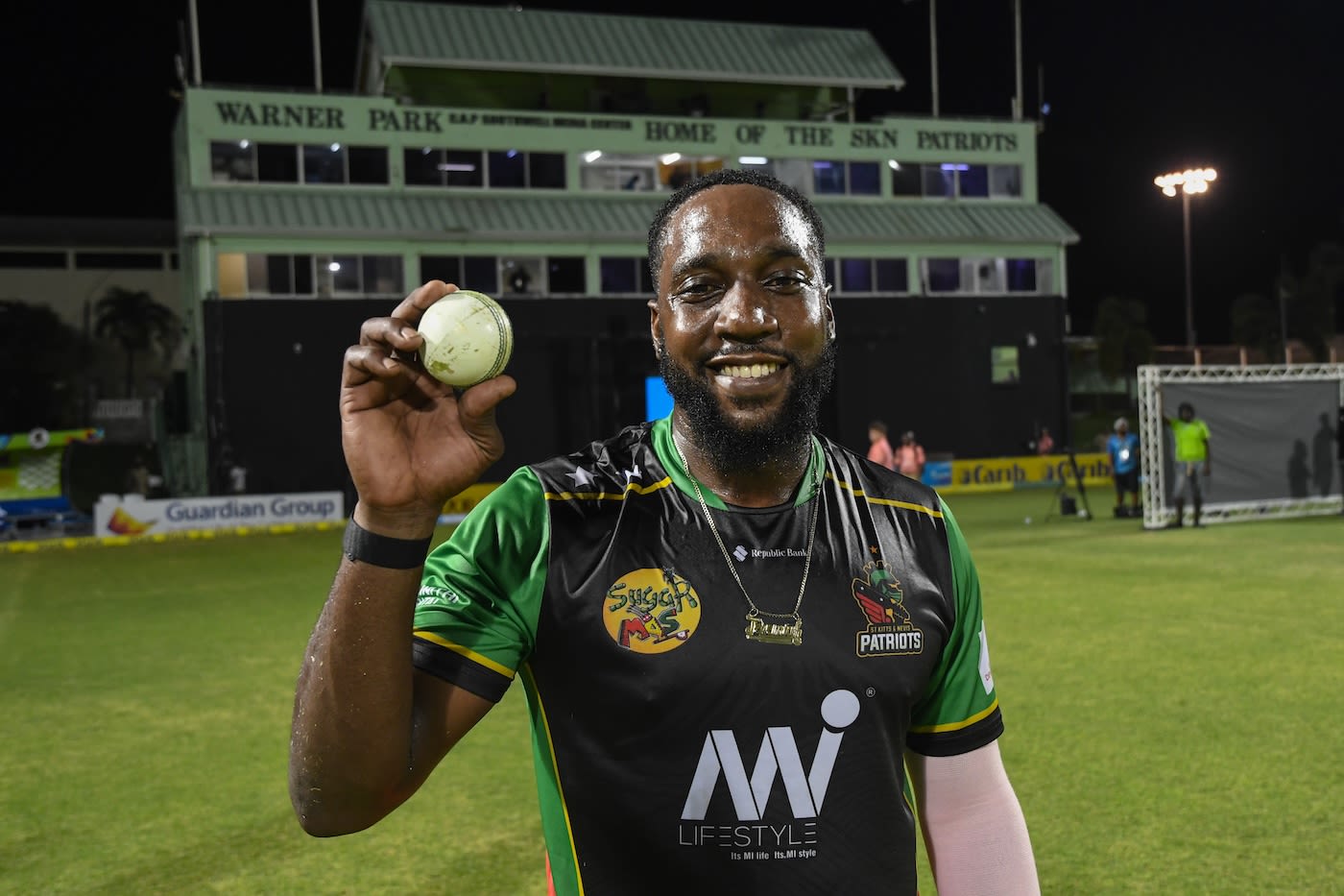 Jeremiah Louis strikes a pose with the match ball
