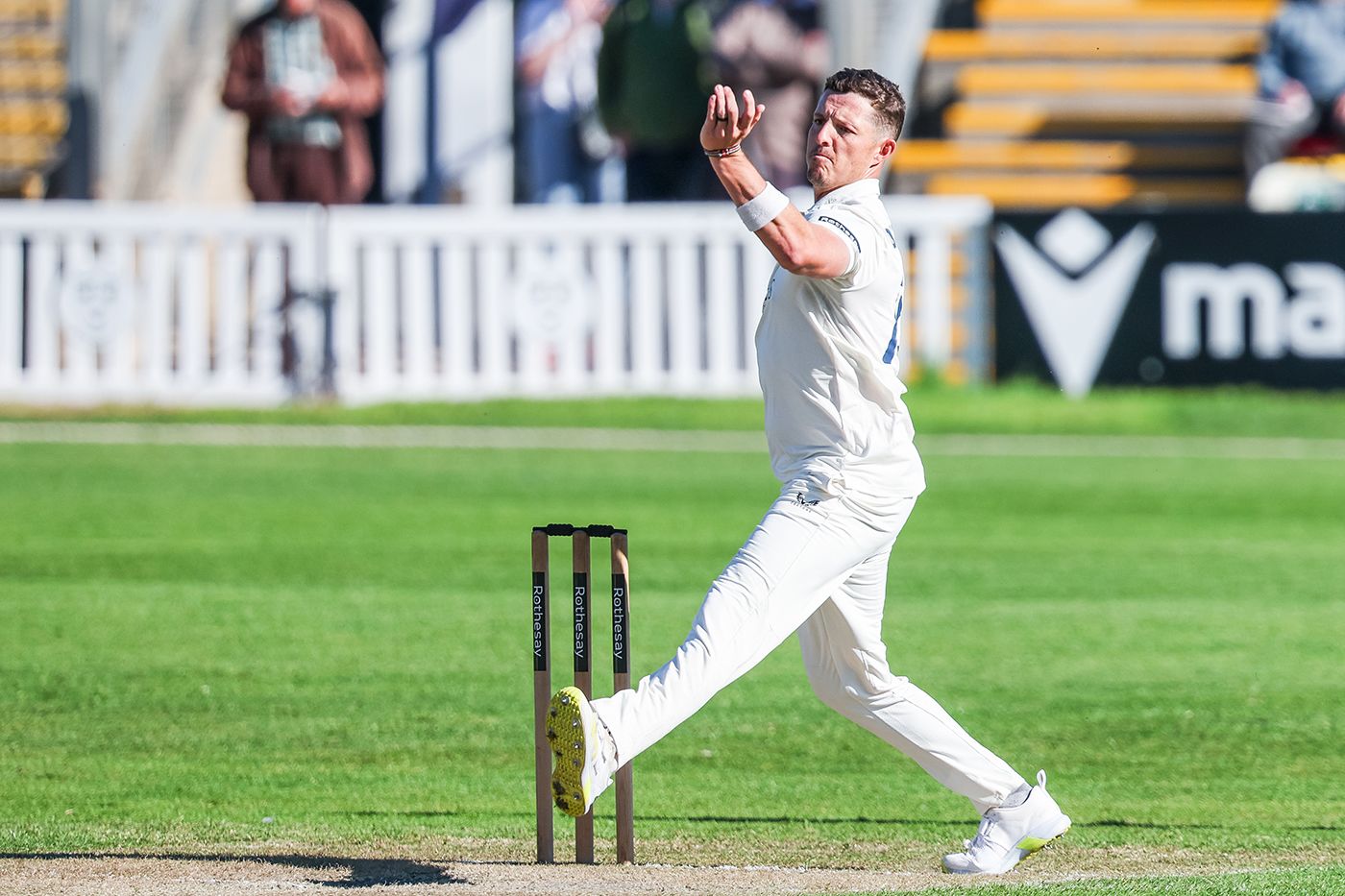 Keith Dudgeon prepares to deliver the ball