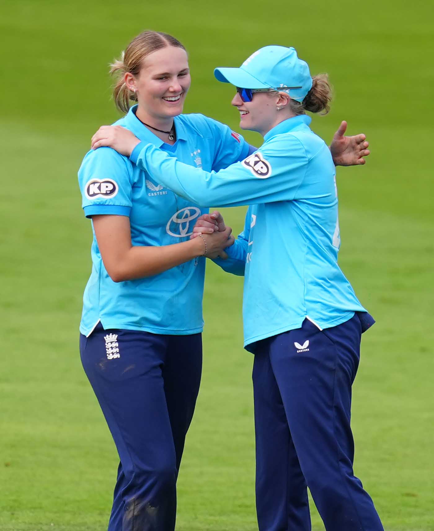 Tilly Corteen-Coleman celebrates with Charlie Dean after bowling Alice Tector