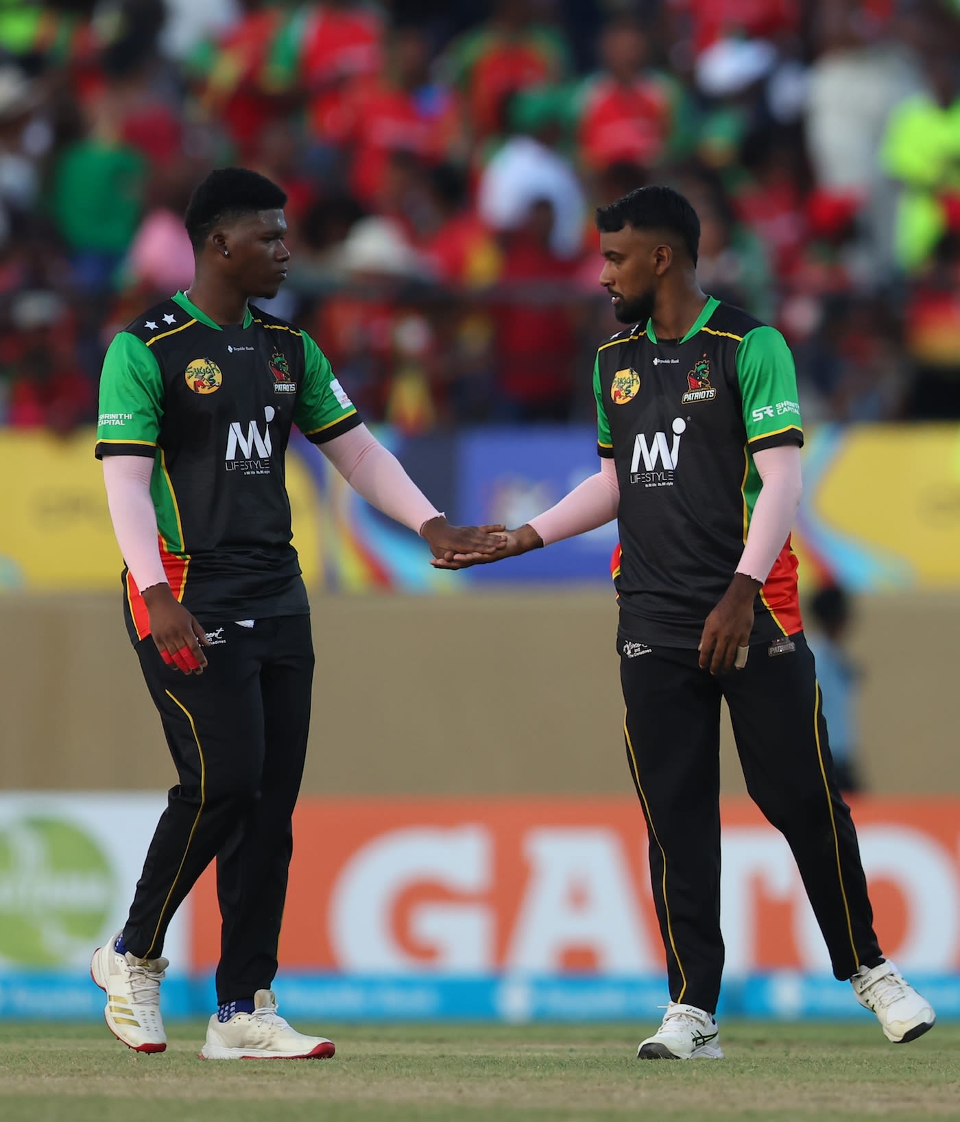 Navin Bidaisee (R) picked up a couple of wickets