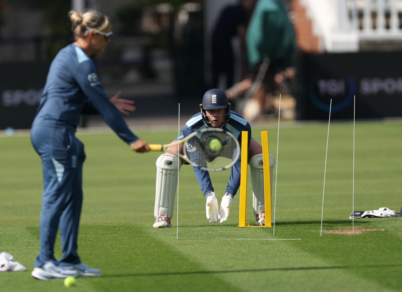 Sarah Taylor puts Jamie Smith through his paces in a keeping drill