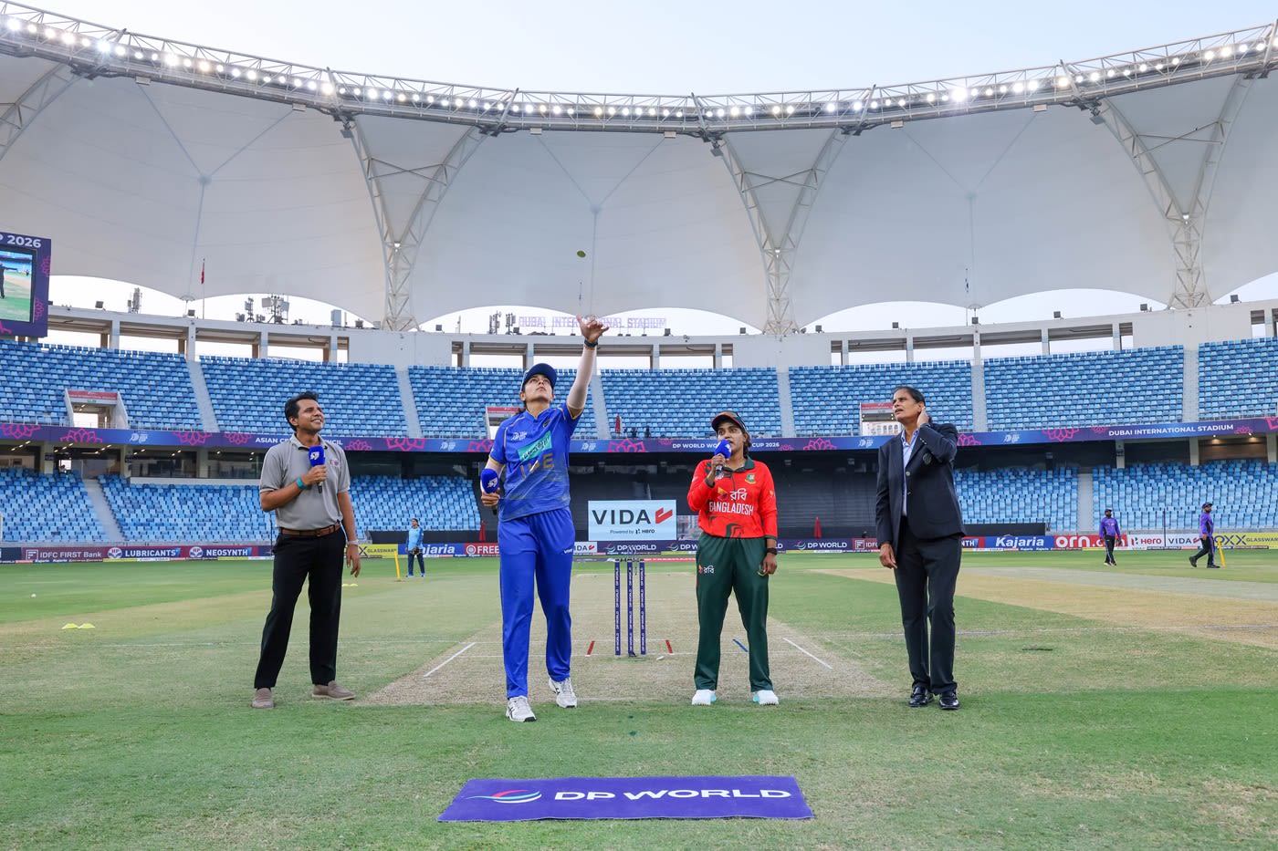 Esha Oza and Nigar Sultana at the toss