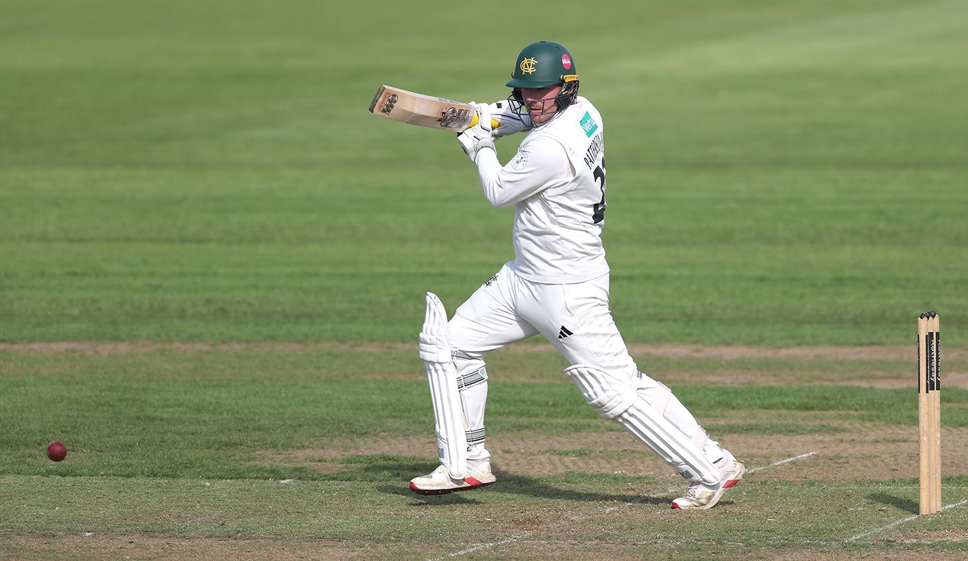 Liam Patterson-White punches into the off side
