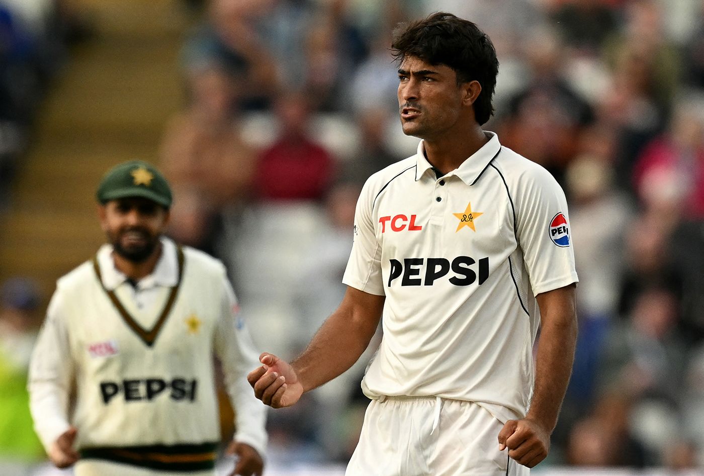 Razaullah celebrates his dismissal of Emilio Gay
