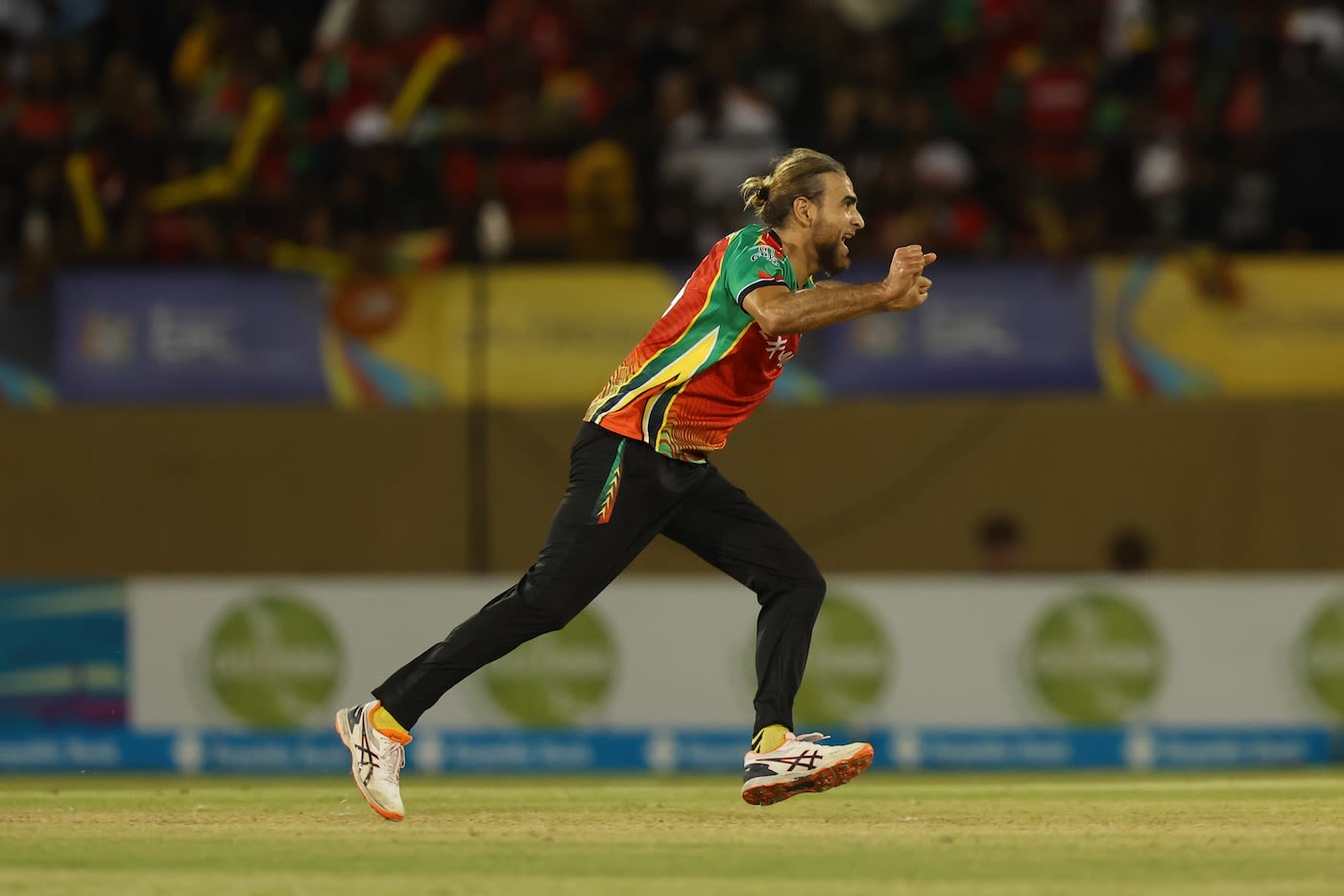 Imran Tahir goes off on his trademark celebratory run