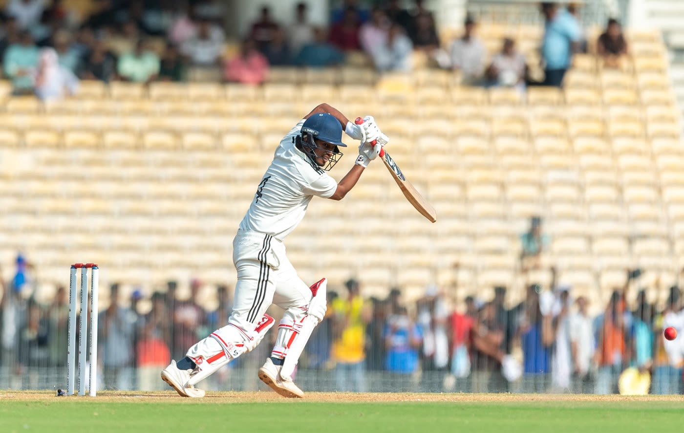Kumar Kushagra punches the ball away