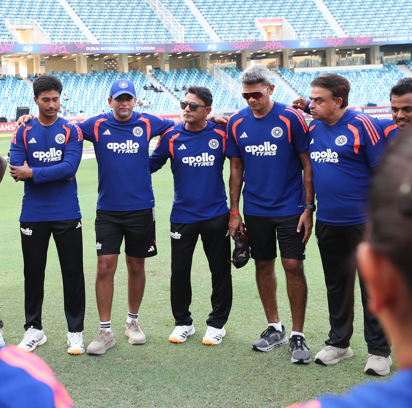Head coach Amol Muzumdar, fielding coach Munish Bali and bowling coach Aavishkar Salvi in the India huddle