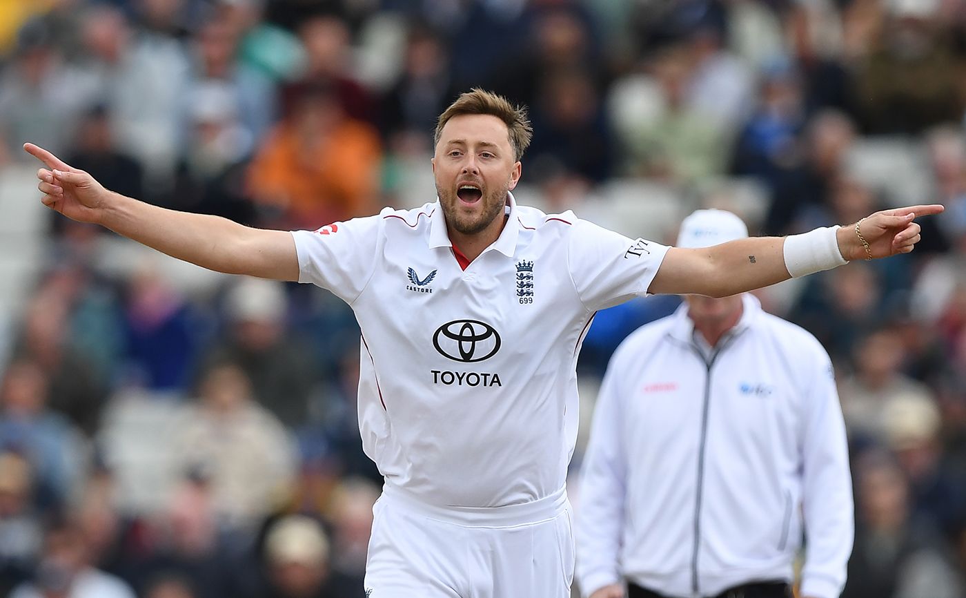 Ollie Robinson wheels away after another first-over wicket