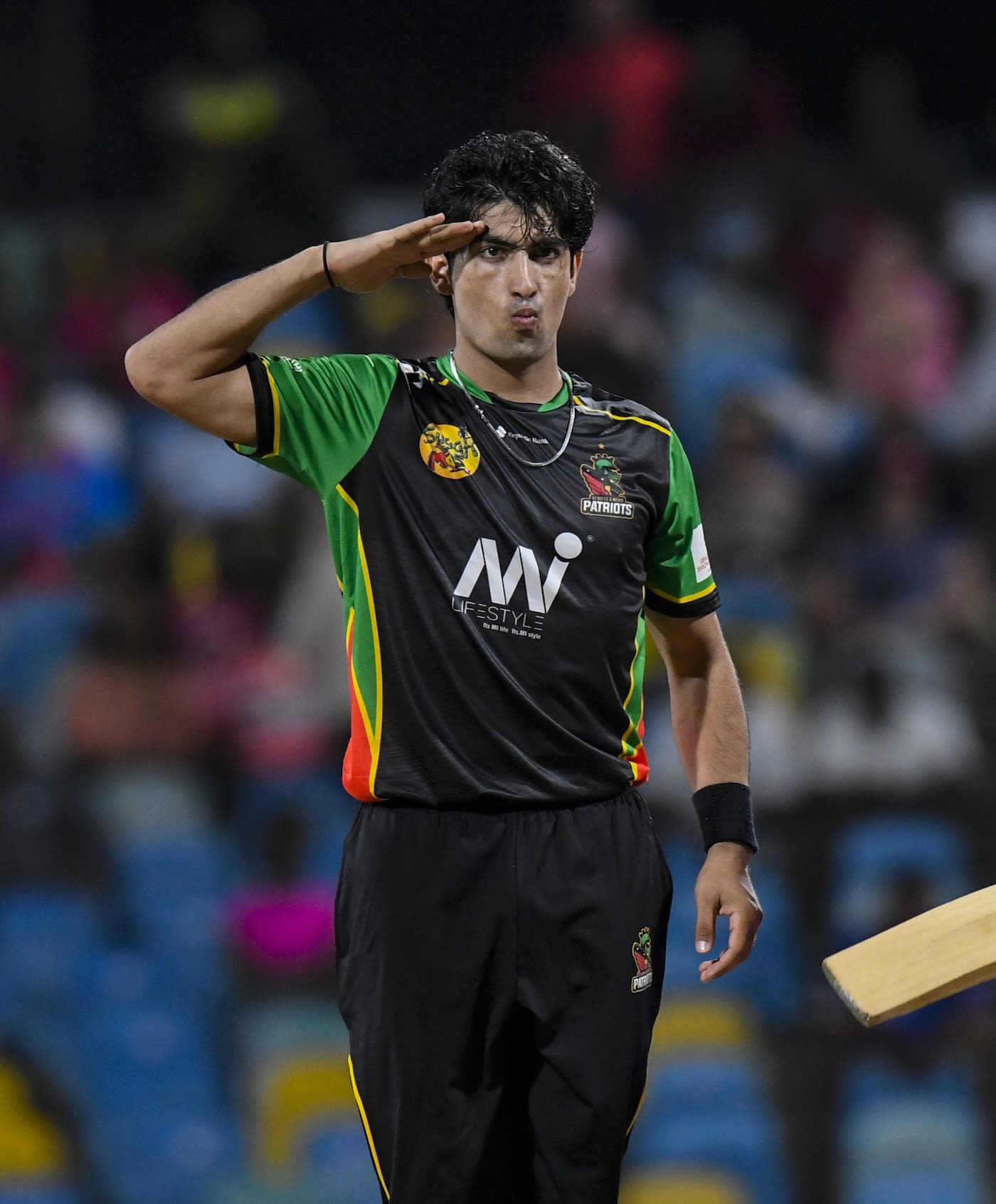 Naseem Shah pulls out a salute after picking up a wicket