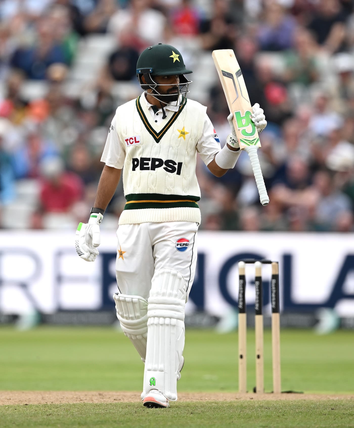 Babar Azam celebrates his first fifty of the series