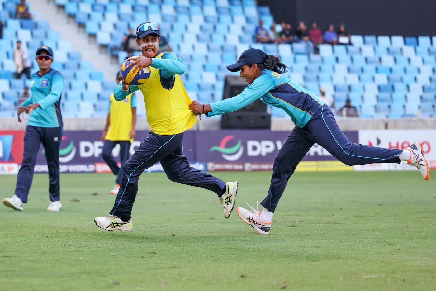 Nilakshika Silva has fun with a team-mate in the warm-ups