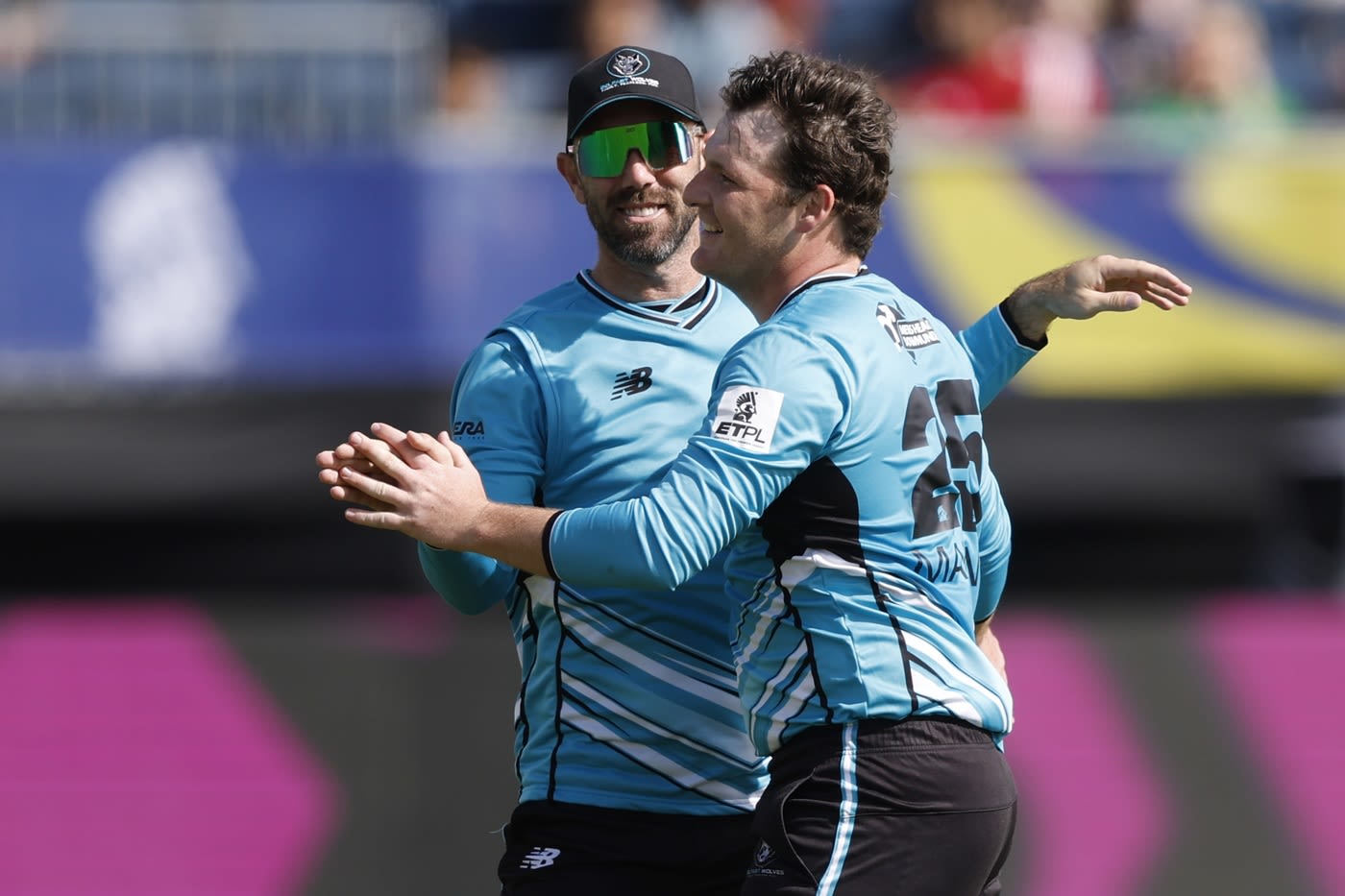 Harry Manenti celebrates with Glenn Maxwell