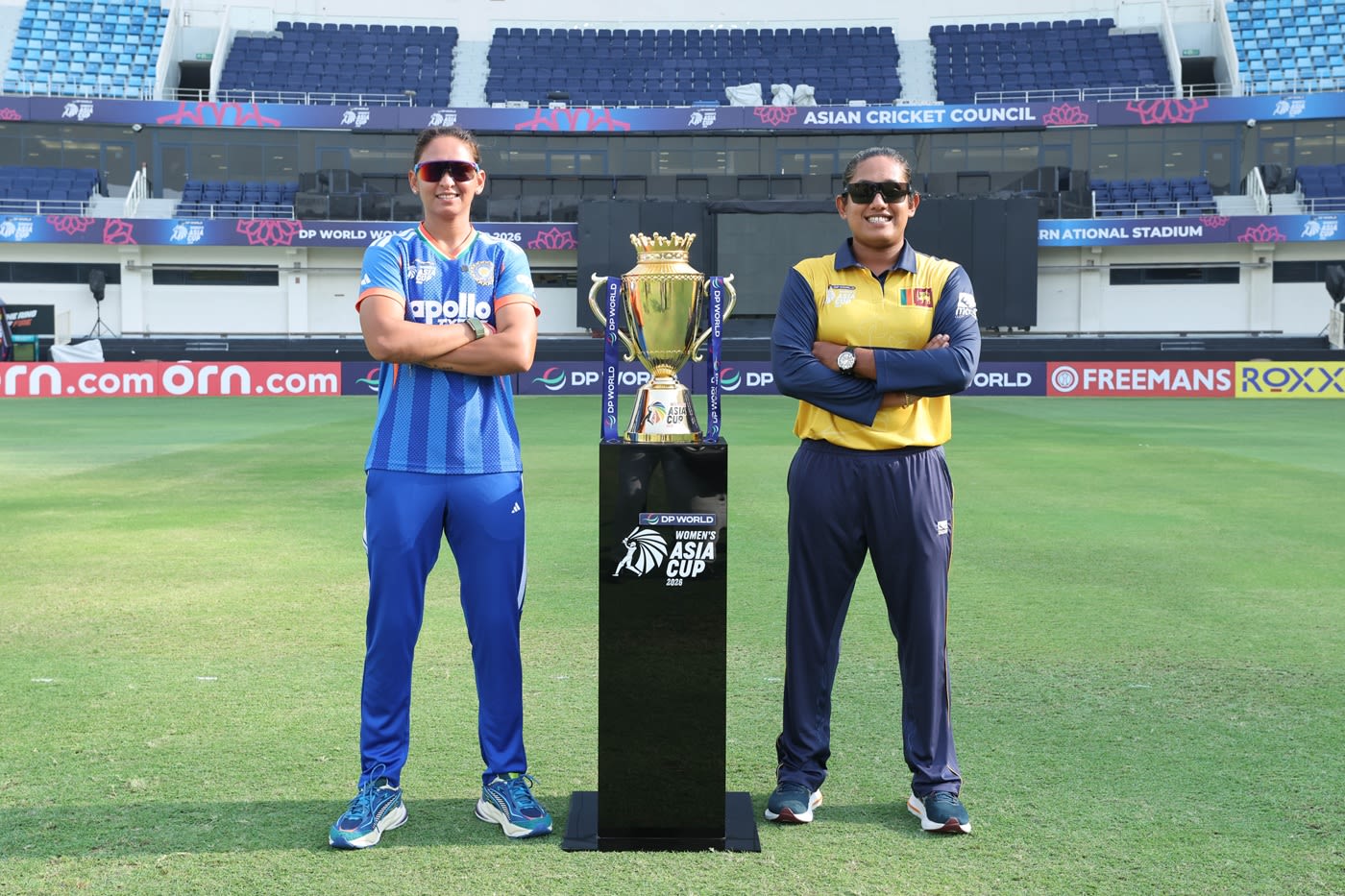Harmanpreet Kaur and Chamari Athapaththu pose with the trophy