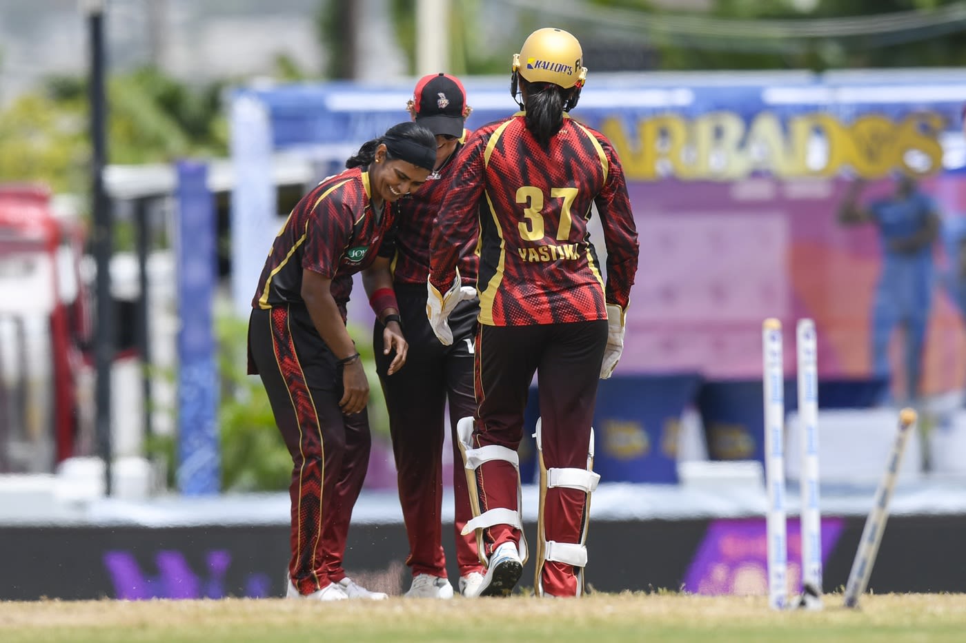 Shikha Pandey and Yastika Bhatia celebrate a wicket