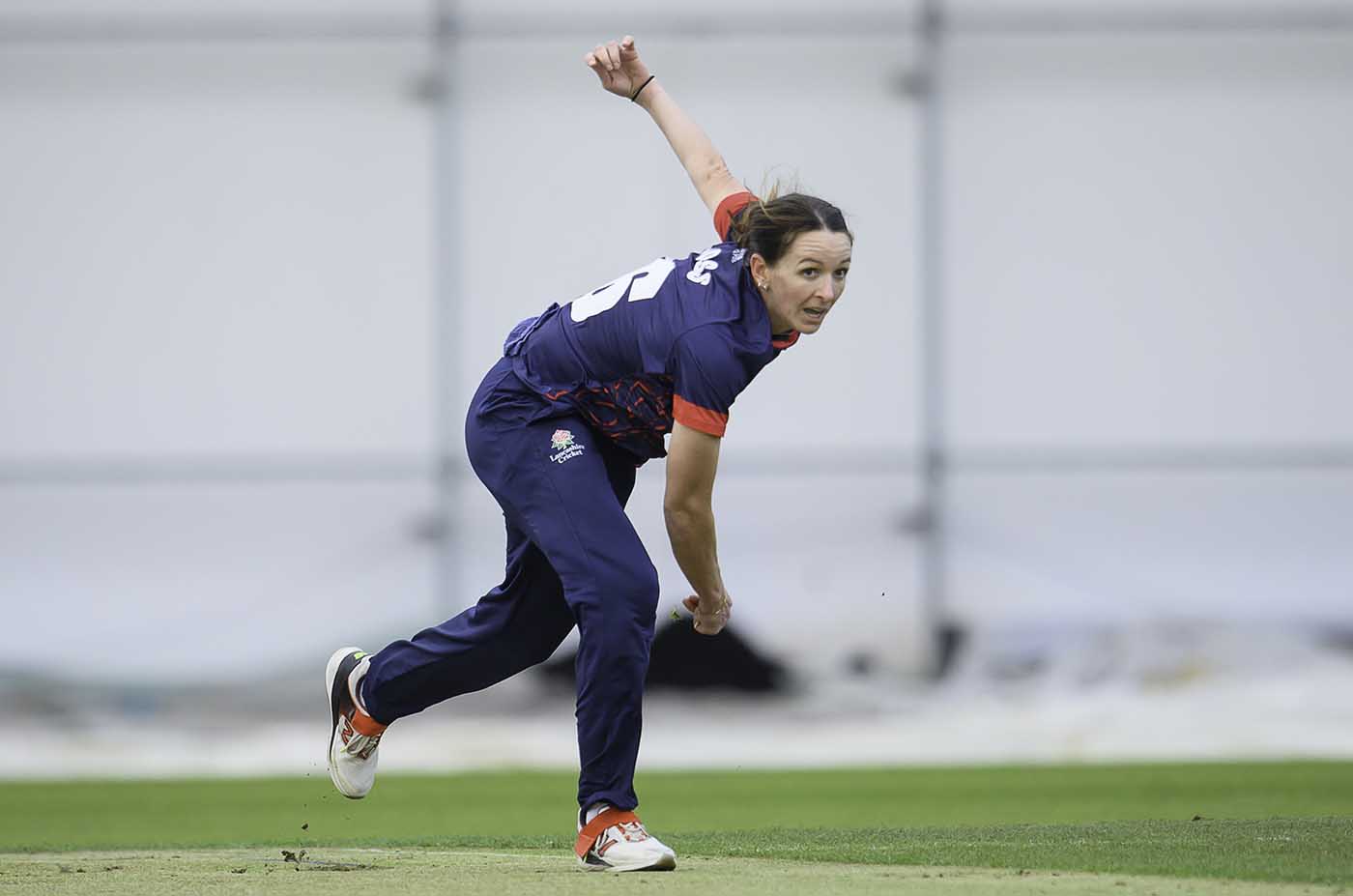 Retiring ex-England seamer Kate Cross sends one down for Lancashire