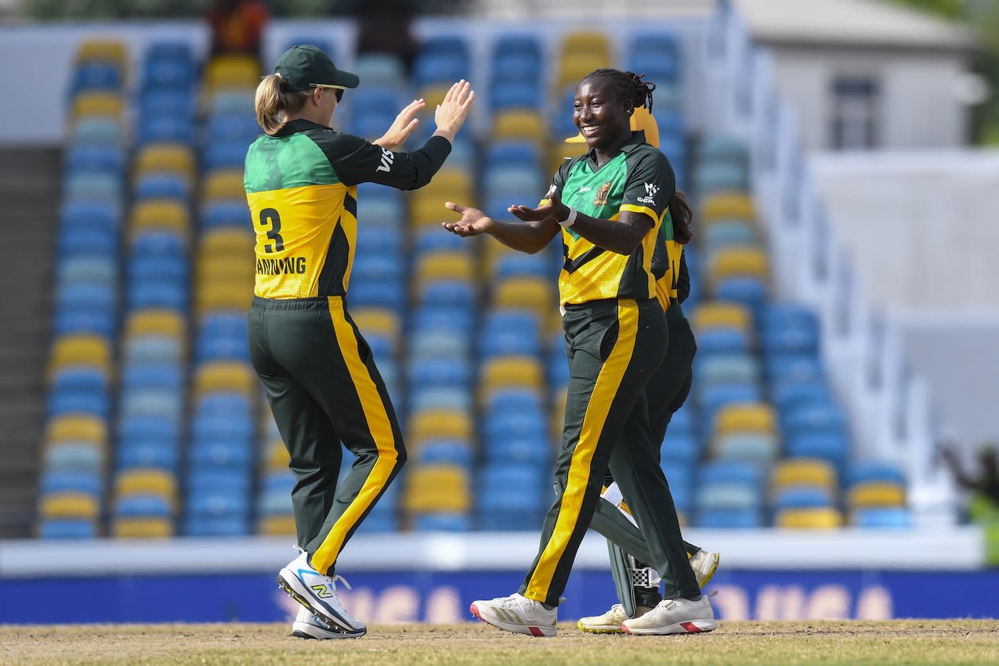 Meg Lanning congratulates Stafanie Taylor for one of her four wickets