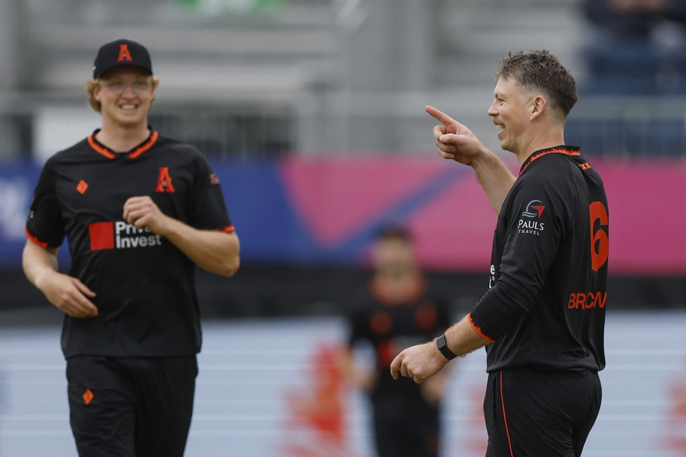 Michael Bracewell and Tim Pringe celebrate a wicket