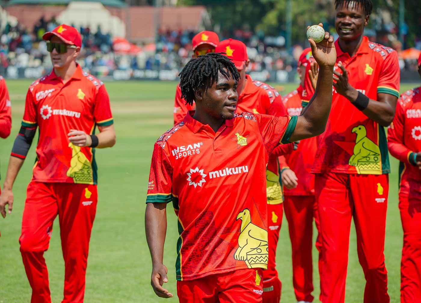 Newman Nyamhuri acknowledges his five-wicket haul as he walks off