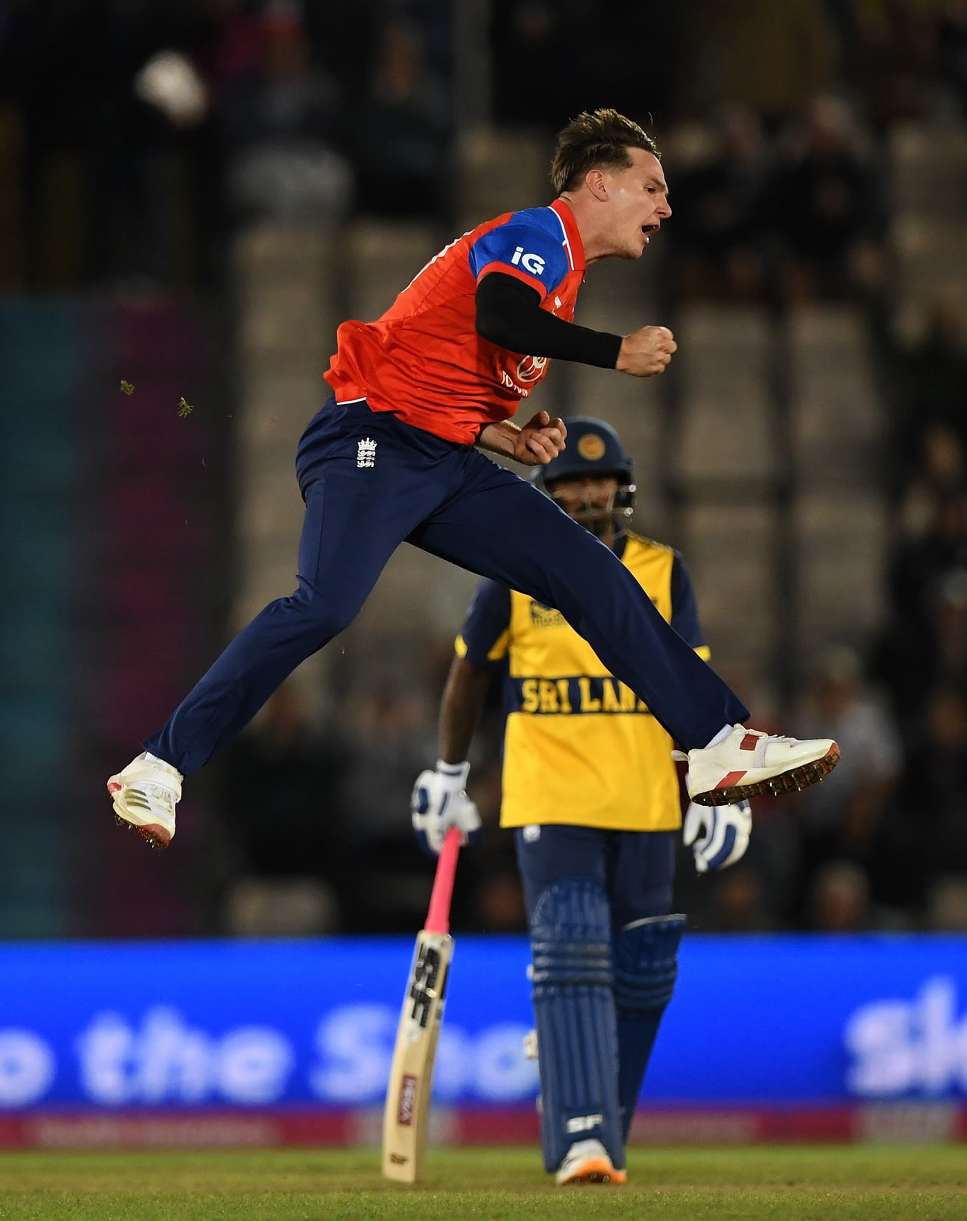 Sonny Baker leaps in celebration