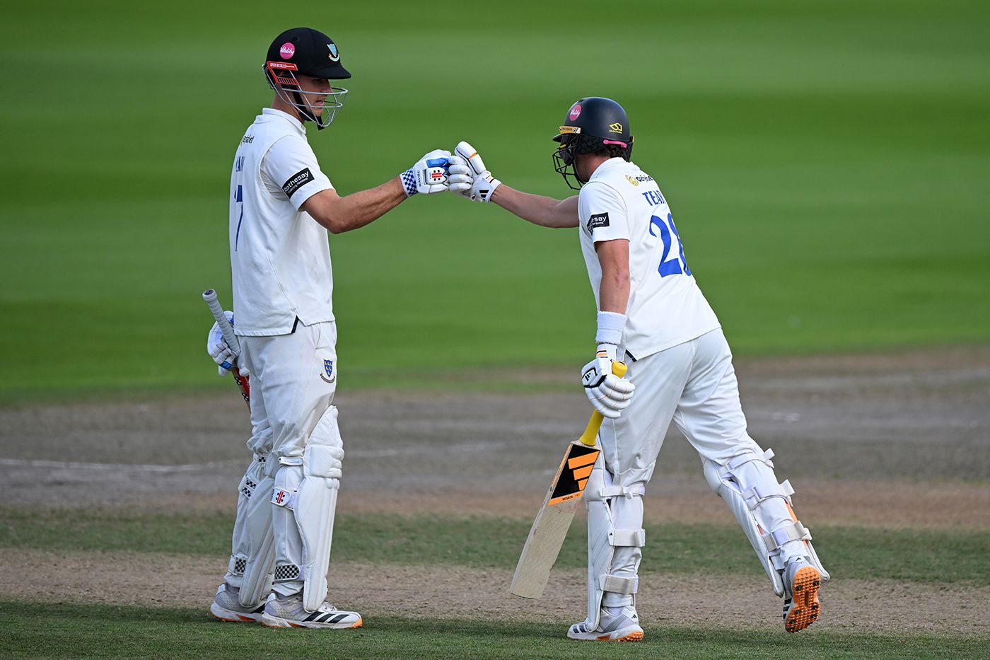 Tom Clark and Charlie Tear celebrate a century stand