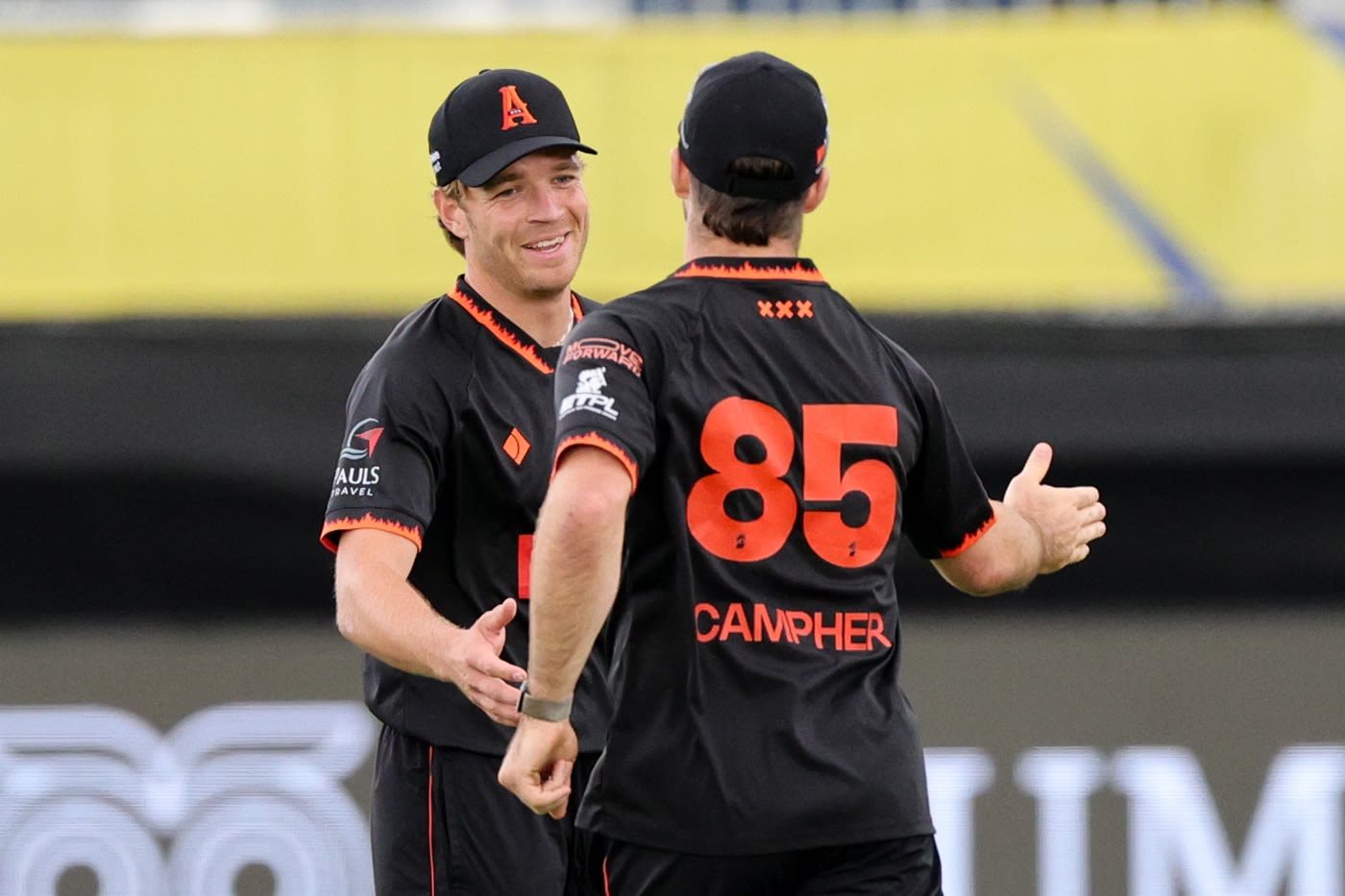 Allrounders assemble: Bas de Leede is congratulated for his T20 best figures by Curtis Campher