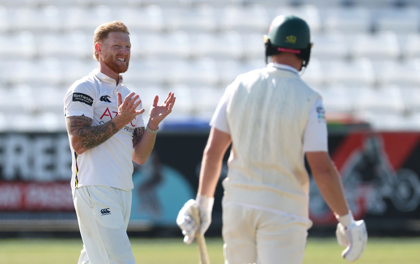 Ben Stokes grimaces during his spell for Durham