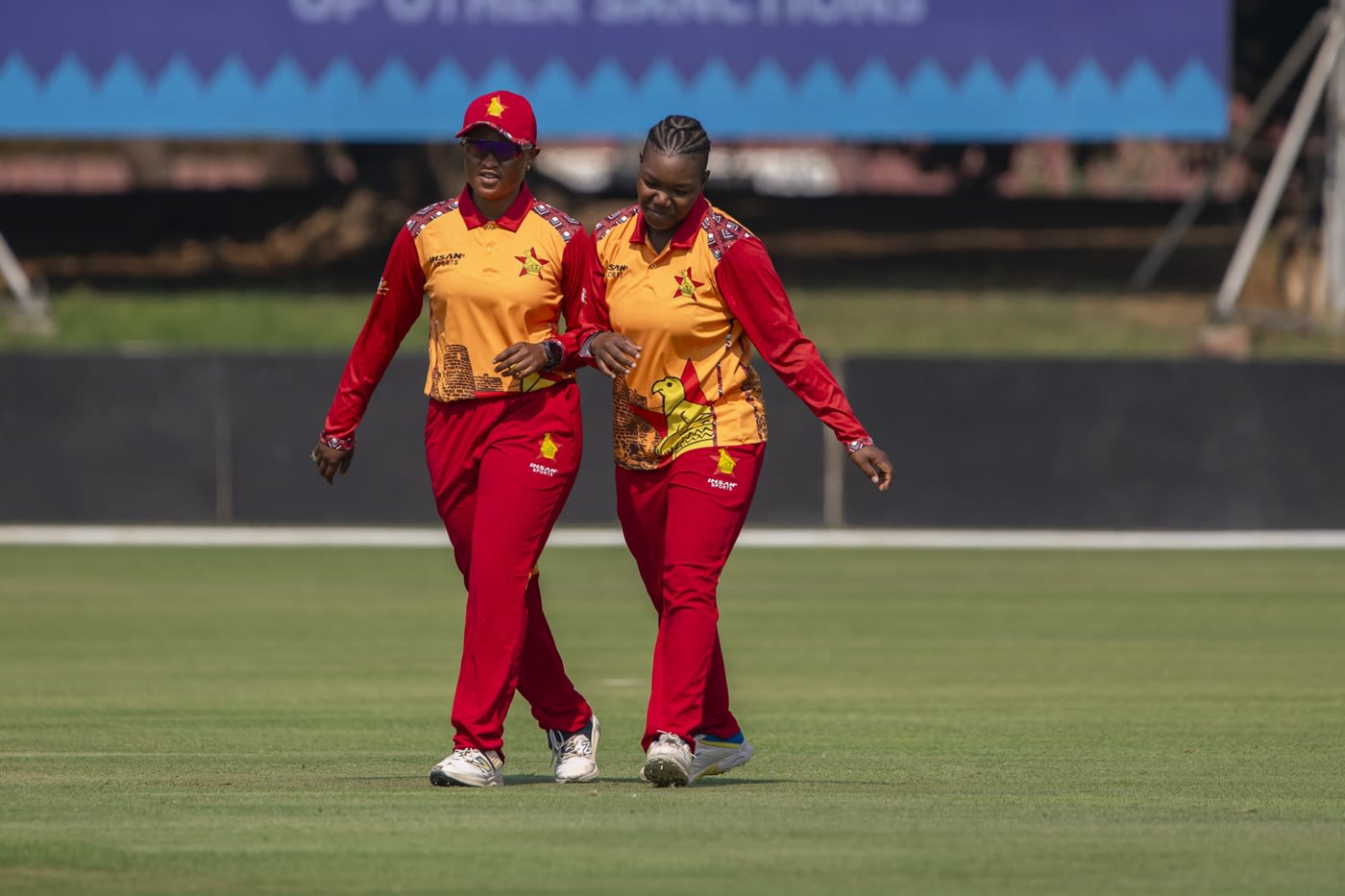 Nyasha Gwanzura celebrates with Josephine Nkomo after breaking the opening partnership