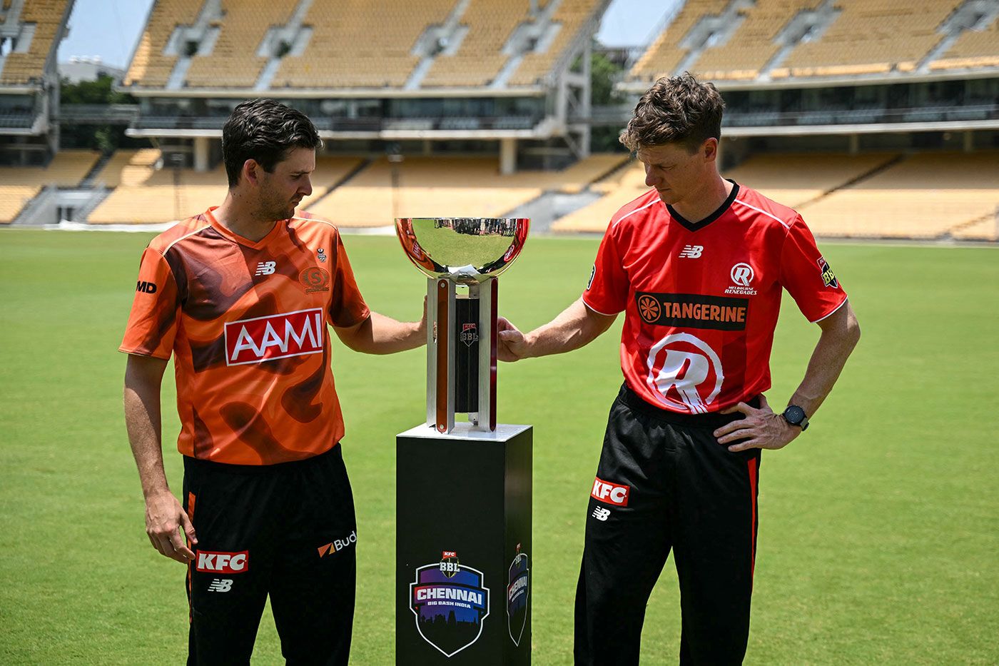 Jhye Richardson and Brendan Doggett with the BBL trophy
