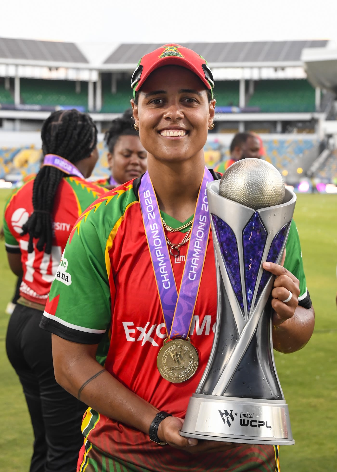 Captain Chloe Tryon poses with the trophy